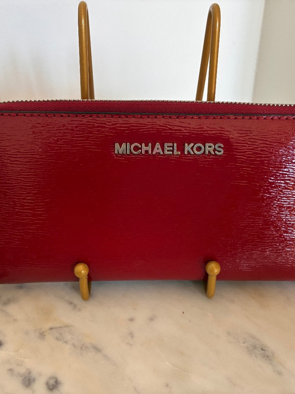 Michael Kors red patent zip around continental wallet